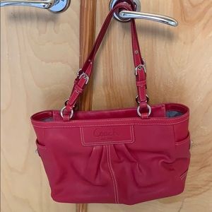 Beautiful red coach tote in like new condition.